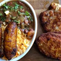 Breaded Pork Chops · 2 Breaded pork chops. Yellow rice. Sweet plantains and black beans.