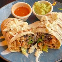 Burrito · Protein wrapped in flour tortilla with queso fresco, crema, avocado sauce, rice and beans. S...