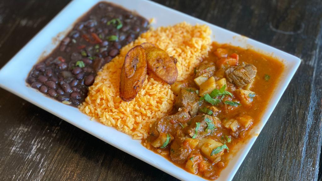 Beef Stew · Beef stew with carrots and potatoes. Rice. Beans and sweet plantains