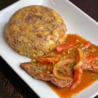 Mofongo · Green plantain mash with garlic and pork. Extra side protein available: steak, pork chops, s...