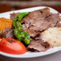 Doner Kebab · Tender veal and lamb mixture, thinly sliced, and charcoal broiled.