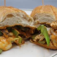 Chicken Fajita Sandwich · Onions, peppers, chipotle, sauce, and mozzarella on a long roll.
