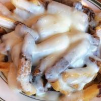 Disco Fries · Mozzarella and brown gravy.