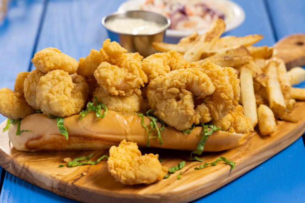Crispy Fried Shrimp Roll  · Shrimply fabulous! Tasty and crispy breaded shrimp stuffed in a grilled brioche roll with shredded lettuce. Served with fries, coleslaw and tartar sauce.