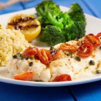 Bright Buoy Haddock · Our signature dish with a boatload of flavor! Lightly seasoned haddock topped with white win...