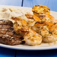 Surf & Turf Grilled Shrimp Skewer Combo · Summer lovin! A juicy, flame broiled, seasoned 8 oz Top Sirloin paired up with two grilled l...