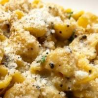 Conchiglie · Pecorino, black pepper, herbs, lemon