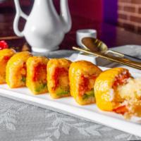 Tropical Island Roll · Shrimp tempura, spicy tuna and avocado wrapped with soy paper.