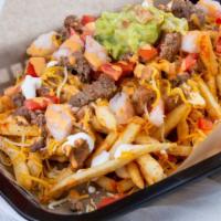 Loaded Fries · Fresh french fries topped with bacon, jalapeños, and cheese.