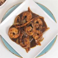 Jerk Shrimp Meal · Shrimp sautéed wih onions and peppers in jerk sauce. Served with rice and peas, white rice o...