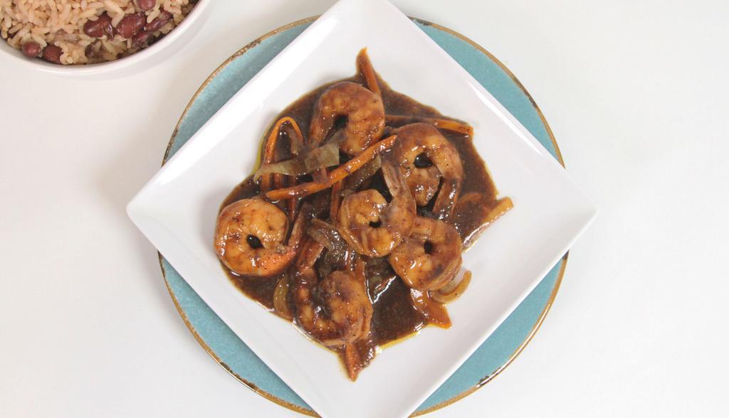 Jerk Shrimp Meal · Shrimp sautéed wih onions and peppers in jerk sauce. Served with rice and peas, white rice or yellow rice and choice of macaroni and cheese, a garden salad, sautéed cabbage carrots, potato salad, candid yams or collard greens.