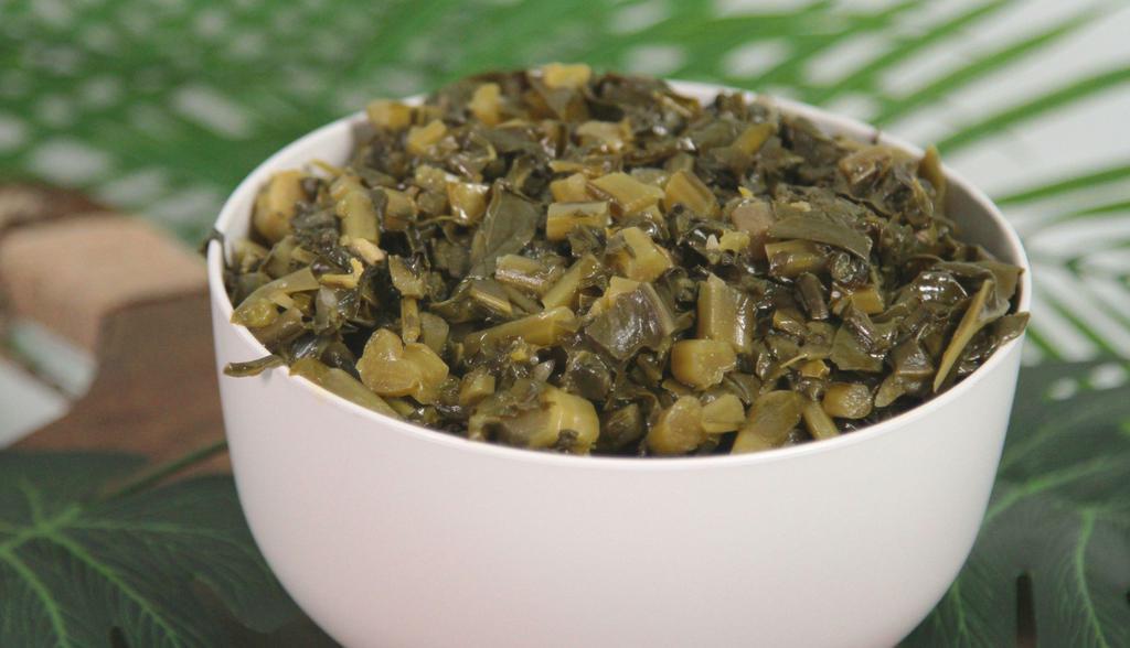 Collard Greens · Fresh collard greens cooked in onions, garlic and fresh herbs and spices.