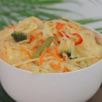 Sautéed Cabbage & Carrots · Cabbage, carrots, green peas, broccoli sautéed with onions, sweet peppers and garlic.