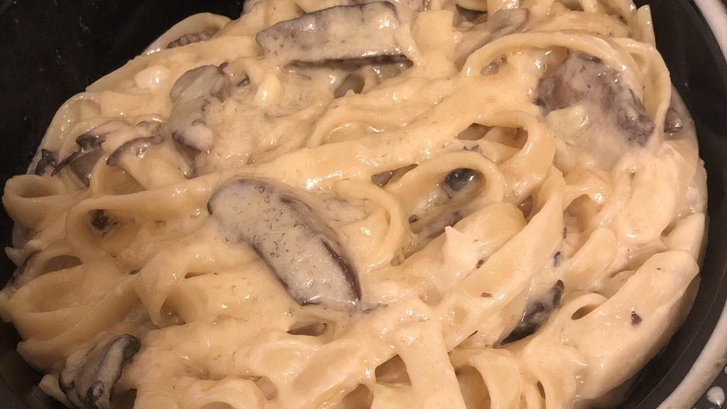 Penne Ala Funghi · Wild mushrooms in cream sauce.