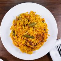 Vegetable Biryani · Long grain basmati rice cooked with fresh vegetables and saffron sprinkled with raisins and ...