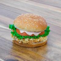 Crispy Cutlet · Corn flake coated chicken  breast on a toasted sesame bun with lettuce tomato and special sa...