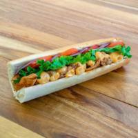 Cajun Chicken · Marinated chicken breast with Cajun spices in fresh baguette ,lettuce tomato red onion and c...