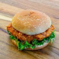 Buffalo Chicken · Hand breaded corn flake coated chicken  breast dipped in buffalo sauce  on a toasted sesame ...