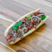 Philly Steak · Thinly sliced steak  grilled bell pepper ,grilled onion on baguette
