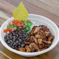Cajun Chicken Bowl · Marinated chicken breast with Cajun spices with jasmine rice black bean guacamole Pico de gayo