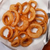 Onion Rings · Crispy onion slices deep fried until golden brown.