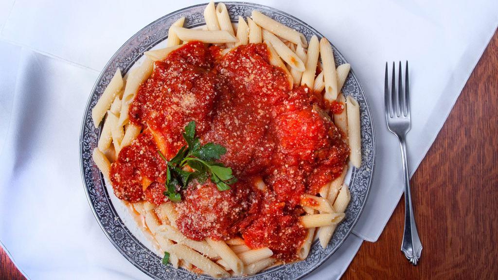 Pasta With Meatballs  · Our homemade Italian crushed tomato sauce served with our homemade fresh 100% ground beef meatballs.