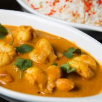 Shrimp Curry · Cooked with curry sauce.