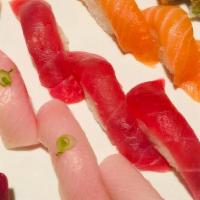 Tri-Color Sushi · Most popular. Three pieces tuna, three pieces salmon, three pieces yellowtail with a rainbow...