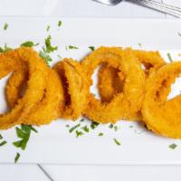Onion Rings · White onions dipped in batter and cooked to a golden finish.