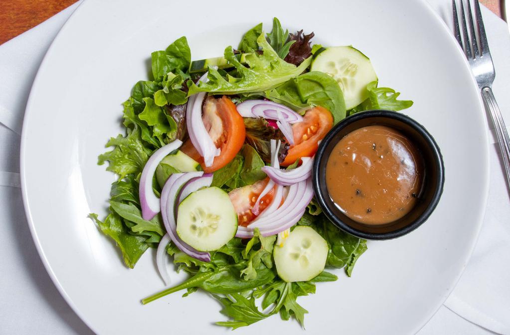 Traditional Salad · Crisp lettuce, tomatoes, croutons, cheddar cheese w/ vinaigrette dressing.