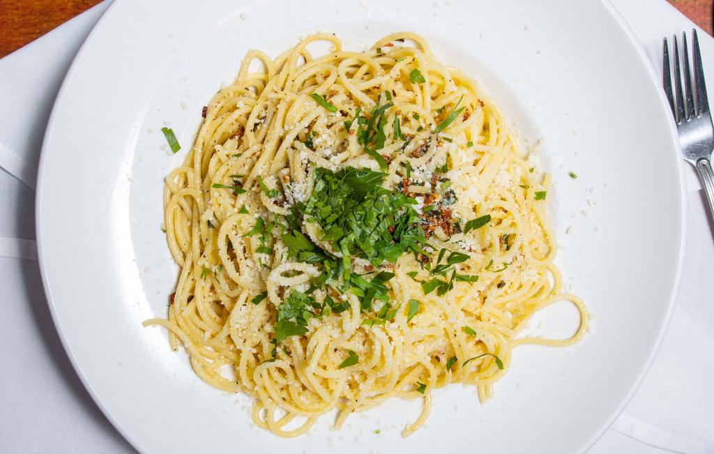 Spaghetti Aglio E Olio · Traditional italian pasta dish with sautéed sliced garlic and olive oil and topped with a little spice.