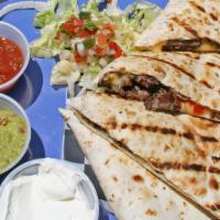 Quesadillas · Toasted overstuffed tortilla with pico de gallo and Mexican cheeses.