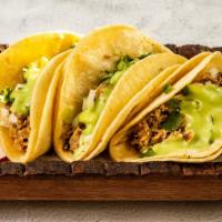 Tacos (3) · Three doubled corn tortillas with your choice of meat with onions, cilantro, guacamole on to...