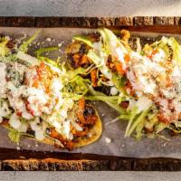 Huaraches (2) · Two homemade oval corn masa with beans, the meat of your choice, lettuce, pico de gallo, cre...