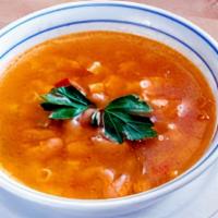 Pasta Fagioli · White and red beans, tomatoes, and pasta in a savory broth.