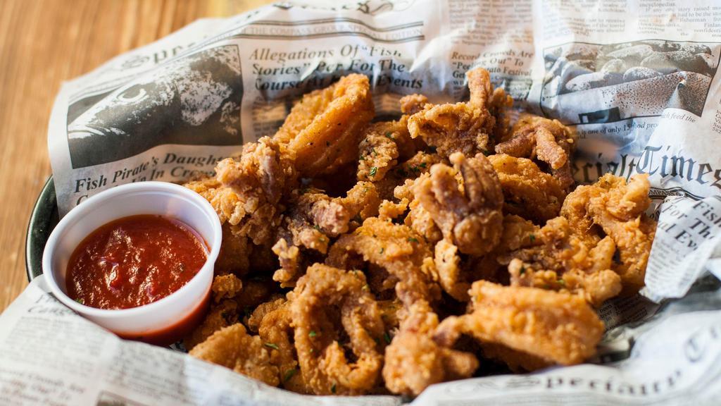 Fried Calamari · Crunchy on the outside, soft on the inside and flavorful all around.