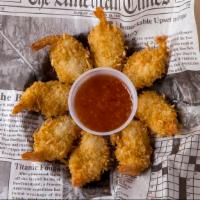 Coconut Shrimp (8) · New! Crispy, coco-nutty and it comes with our tasty Sweet Chili Sauce.
