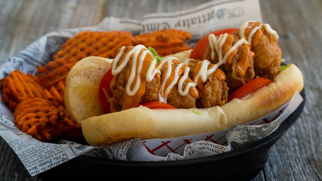 Shrimp Po Boy · Jumbo shrimp, fried to perfection, wrapped lovingly in a warm bun. Need we say more?