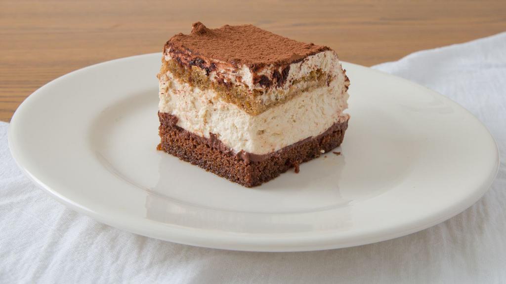 Tiramisu · Layers of ladyfingers soaked in Kahlua on top of a layer of heavenly mascarpone and topped with powdered cocoa.