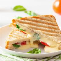 Cheddar Cheese Sandwich · Delicious and rich blend of cheddar cheese on a sourdough bread.