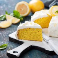 Lemon Coconut Cake · Rich lemon and coconut cake with creamy butter.