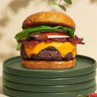Bacon From Beyond Burger · Seasoned Beyond Meat patty perfectly cooked to medium, topped with loads of crispy vegan bac...
