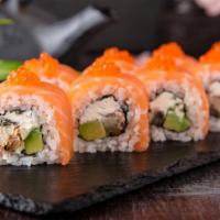 Salmon & Avocado Roll · Salmon and avocado with seaweed wrapped in rice.