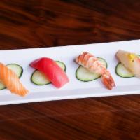Sushi (4 Pc) · Tuna, salmon, yellowtail, shrimp.