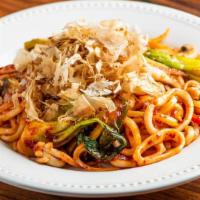 Calamari Bokum Over Udon Noodles · Hot. Spicy calamari with onion, peppers, mushroom, bonito flakes (dried fish) over udon nood...