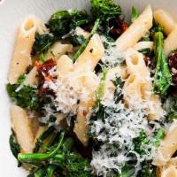Broccoli Rabe & Sausage  · Linguini with broccoli rabe and sausage sautéed in fresh garlic and olive oil.