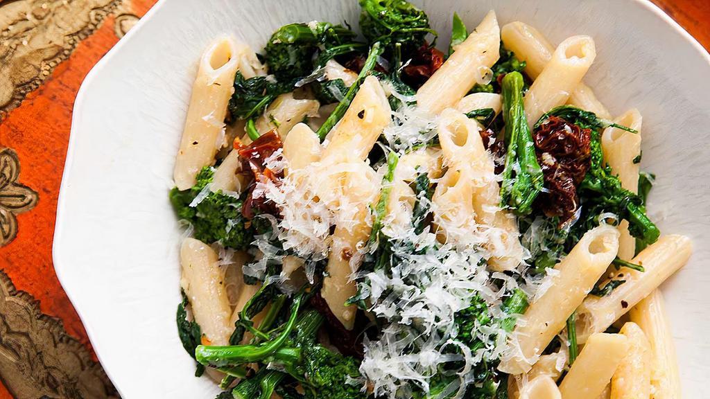 Broccoli Rabe & Sausage  · Linguini with broccoli rabe and sausage sautéed in fresh garlic and olive oil.