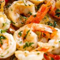 Shrimp Scampi · Fresh jumbo shrimp in light butter, garlic, and white wine sauce.