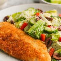 Milanese · Cutlet topped with chopped lettuce, tomatoes, onions, and mozzarella with a light Italian dr...