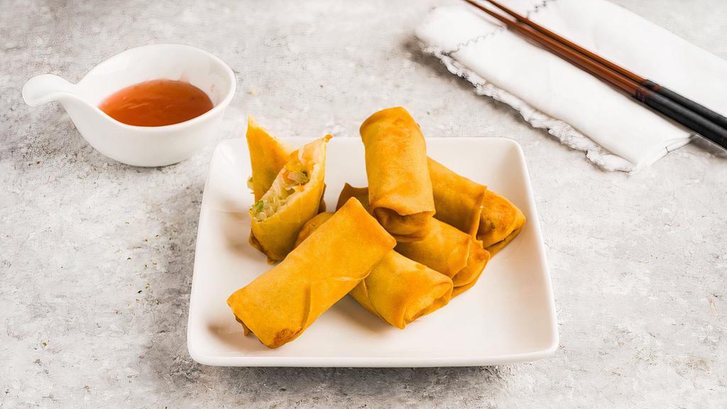 Fried Vegetable Spring Roll (6 Pieces) / 炸菜春卷 · Fried vegetable filled spring roll served with sauce.